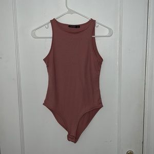 Pink sleeveless body suit